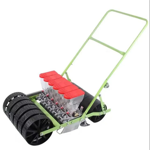 Manual Corn Planter And Seed Drill For Easy Planting Garden Seeder Machine with red seed compartments and black wheels