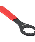 Get That ER32 Collet Chuck Wrench Spanner Tight With High Strength Steel O Type Tool For CNC Milling And Lathe Machines Red Black Finish. Close-up of spanner tool with a red handle.