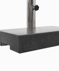 Close-up of Beefy 25Kg Granite Parasol Base With Locking Bolts And Adapter, highlighting heavy duty granite material and metal pole.