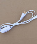 Two Pack T5 T8 Grow Light Power Cord With On Off Switch Five Foot US Plug Extension Cable lying on a brown surface