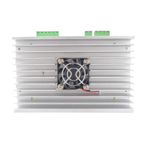 Stepper motor driver module on silver aluminum heatsink with cooling fan and green terminal blocks.