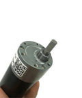 JGB37-3650 Brushless DC Motor 12V 24V High Torque Gearbox For Robotics DIY Projects And Automation Builds With Smooth Speed Control and Reliable Power Delivery, showing the motor's output shaft.