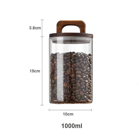 Premium Glass Coffee Canister With An Airtight Wooden Lid, 1000ml capacity, filled with coffee beans, measuring 15cm tall.