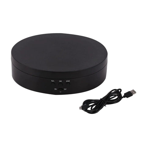 Motorized Rotating Display Stand With Electric Turntable For Products Photography Display Jewelry Watch 3D Models Cake Collectibles Featuring Manual Speed Adjustment And Multiple Angular Views In Sleek Matte Finish, round black USB powered turntable with buttons.