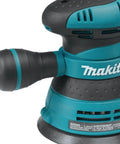 Close-up of a 5 Inch Random Orbital Sander With 3.0 Amp Motor, Variable Speed From 4,000 To 12,000 OPM, Ergonomic Rubberized Palm Grip.