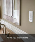 Bathroom with GFCI Outlet 20 Amp Self Test Tamper Resistant With LED Indicator Light White GFTR2-W on wall, protecting against shocks.