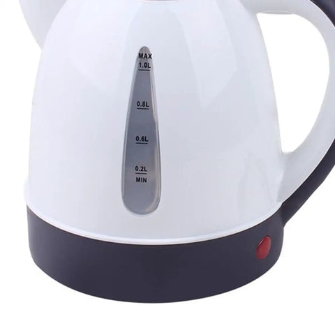 Game Changer Dual Voltage Car Kettle Works With 12V And 24V Systems Portable Water Heater 1 Liter size with measurement gauge.