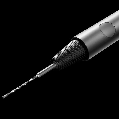 Close-up of Slick Mini Electric Screwdriver 11 In 1 Cordless Drill Kit with 8 Bits showing drill bit detail on black background.