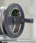 Close-up of Beefy Durable Insulated Plastic Hand Wheel With Revolving Handle, mounted on machinery, showing 3 spoked design.