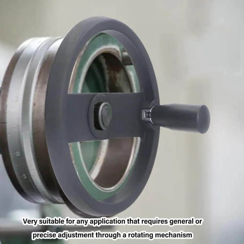 Close-up of Beefy Durable Insulated Plastic Hand Wheel With Revolving Handle, mounted on machinery, showing 3 spoked design.