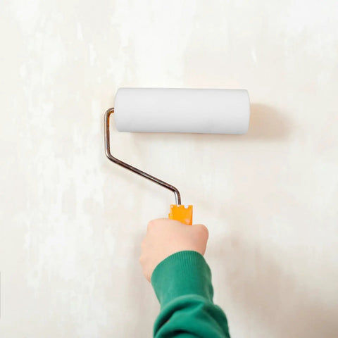 Mini Foam Paint Roller Sleeve Set Knockout Touch Ups And Wall Refresh With Reusable Build being used on a wall surface.