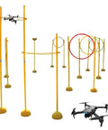 Drone Racing Obstacle Course Kit for Beginners and Pros: Easy to Build Training Gear for Indoor and Outdoor Flying, showing two drones and yellow poles.