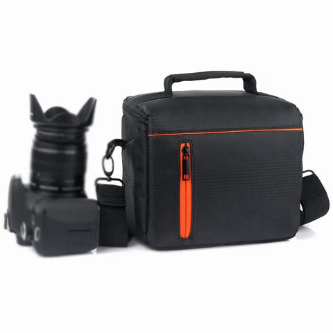 Rugged DSLR Camera Bag Backpack With Padded Interior And Sturdy Nylon Shell next to a camera and lens, featuring orange zipper accents.