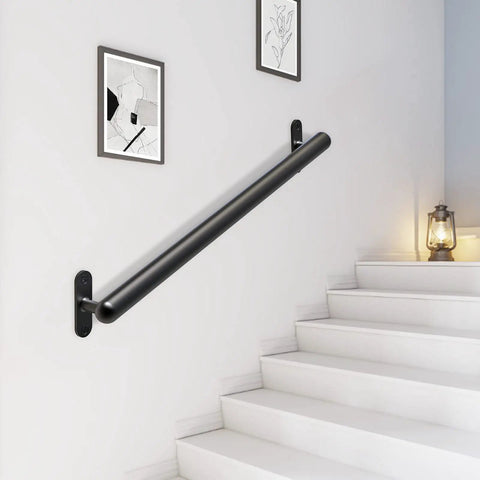 Hardcore 16 Inch Wall Mount Metal Handrail For Stairs Rock Steady Non Slip Safety Grab Bar For Elderly Indoor Outdoor Steel Support Railing With No Sweat Setup Black mounted on a wall beside stairs.