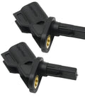 Pair of black plastic front ABS wheel speed sensors with brass mounting bushings.