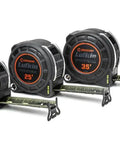 Three black tape measures, 16, 25, and 35-foot, with clear readouts and locking blades. Front tape is Home Measuring Tape And Layout Tool Black 35 Foot Tape Measure For DIY Projects Durable Hand Tool With Clear Readout And Locking Blade For Precise Layouts In Carpentry And Home Improvement.