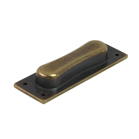 Single antique brass recessed door edge pull for sliding doors and cabinets, size 85x31x13 mm, solid brass construction, rust resistant.