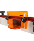 Heavy Duty 32 Inch Router Table Fence System With Premium Steel Rail Quick Lock Stops And Dedicated Dust Port close-up of dust port and clamps.