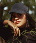 Bump Cap Safety Hat Baseball Cap Style With Breathable Lightweight Build Grey worn by person in outdoor setting.