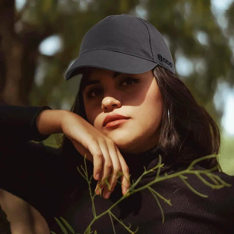 Bump Cap Safety Hat Baseball Cap Style With Breathable Lightweight Build Grey worn by person in outdoor setting.