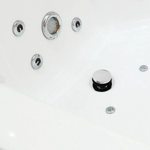 Universal Bathtub Drain Stopper Press Plug with Copper Core installed in a modern bathtub drain, featuring chrome finish.