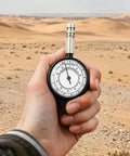 Absolute Must Have Premium Outdoor Gear For Weekend Warriors Compact Manual Map Distance Roller With Precision Alloy Tracking Wheel for Hiking Camping Trips in hand in desert.