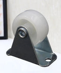 12 Pcs White 1 Inch PP Nylon Caster Wheels for Furniture and Office, close-up of a single caster wheel on a metal plate.