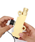 Universal Brake Proportioning Valve Wire Sensor And Wiring Harness Compatible With Pv2 Pv4 Pv6 Systems held in hand, golden finish.