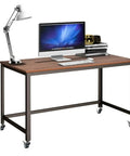 Smooth Ride Rolling Computer Desk With Lockable Wheels And Heavy Duty Steel Frame Portable Laptop Workstation with wood top and lamp.