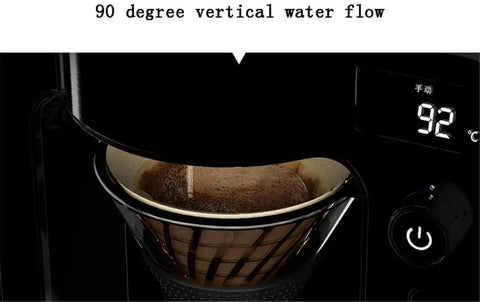 Close-up of Five Cup Coffee Maker With Glass Carafe, One Touch Brew feature, showing 90-degree water flow during brewing.
