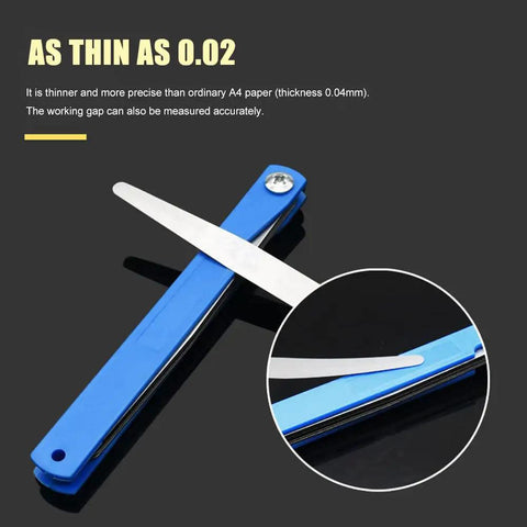 Top Shelf Feeler Gauge Set With Rock Solid Stainless Steel Blades For Nailing Dead Accurate Gap Measurements And Tappet Valve Adjustments On Every Hardcore Hobbyist Or Weekend Mechanic Garage Project, showing thin stainless steel blades and blue handle.