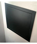 Hella Durable Metal Access Panel For Drywall Ceilings 12 By 20 Inch Black Inspection Hatch viewed from the side in a drywall setting.