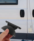 Heavy Duty Nylon Door Catch Retainer Set For Rv Camper Motorhome with secure grip being held near RV door.