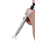 4 Claw Grabber Tool Stainless Steel Pick Up Tool With Four Prongs in hand