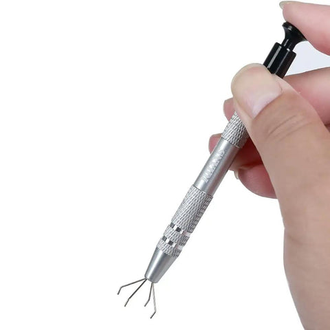 4 Claw Grabber Tool Stainless Steel Pick Up Tool With Four Prongs in hand