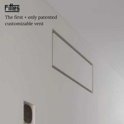 Lux Satin White Flush Wall Vent Cover In Solid Steel mounted on wall, minimalist design, 6x14 inch size with adjustable damper