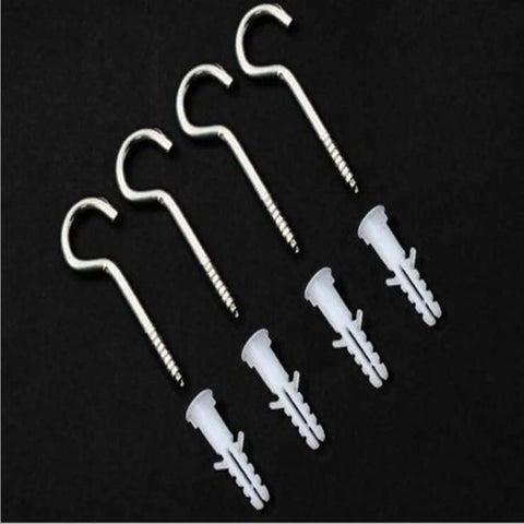 Five silver metal hook screws and five white plastic wall anchors arranged on a black background.