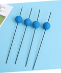 Blue Carbon Fiber RC Helicopter Landing Gear Training Kit Universal Fit Pro Grade with sponge feet on a light blue surface.