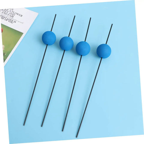 Blue Carbon Fiber RC Helicopter Landing Gear Training Kit Universal Fit Pro Grade with sponge feet on a light blue surface.