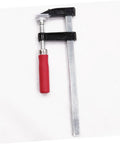 Heavy Duty Woodworking Clamps Set For Fastening Pliers And Quick Clamps Your Go To Tool For Industrial And Crafts Durable Steel Clips Simple To Use And Built To Last For Secure Woodworking Projects. Single metal clamp with red handle on white background.