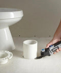 Person using MM50-01 Multi-Max Oscillating Tool Kit Pro Grade with Low Vibration for precise clean cuts near plumbing fixture