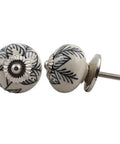 Top Shelf 100 Piece Black Ceramic Orchid Drawer Knobs Heavy Duty Kitchen Cabinet Hardware with floral design detail.