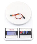 2 Pack Micro 1A Mini ESC on scale, showing 2g weight, for RC aircraft and drones, ultra lightweight 0.4g, 12x8.5mm size