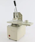 Pro Electric Curtain Punch Machine With Knives For Workshop Cutting And Punching Blinds Tools 48mm And 53mm Dies Heavy Duty in beige color, side view.