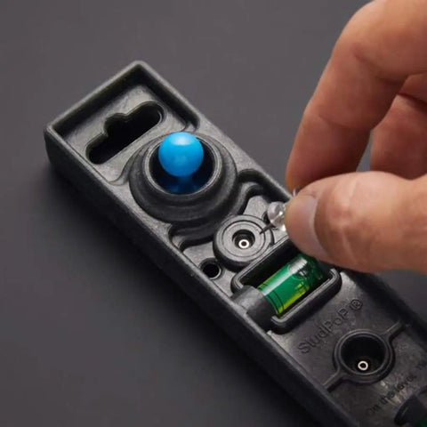 Straight Shooter Heavy Duty Dual Moving Magnet Stud Finder With Built In Nine Inch Level shows manual controls and level indicator.