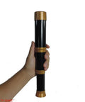 Black And Gold Collapsible Telescope Costume Prop For Theater And Cosplay, Extends From 7 Inch Closed To 12.5 Inch Open, Plastic Build With Realistic Pirate Style Look For Dress Up, Stage Performances, And Costumes For Teens 14 And Up. Black and gold plastic telescope prop held in hand, collapsed