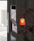 Slick Smart Door Lock Featuring Built In Camera Voice Intercom And Fast Fingerprint Scan Password Entry Along With Hella Secure Auto Deadbolt Delivering Darn Top Shelf Protection Always with warning light.
