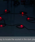 50Ft Outdoor Power Extension Cord With Seven NEMA 5 15R Outlets glowing red in the dark, suitable for outdoor, stage setups.