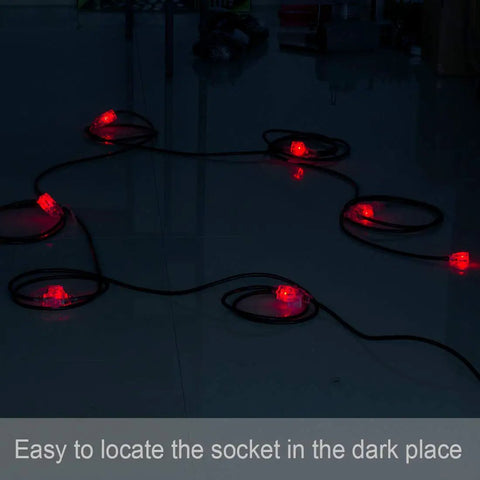 50Ft Outdoor Power Extension Cord With Seven NEMA 5 15R Outlets glowing red in the dark, suitable for outdoor, stage setups.