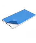 Close-up of Dope Ultra Slim Aluminum Heatsink Kit 100x50x4mm with pre-applied blue thermal conductive tape for passive cooling